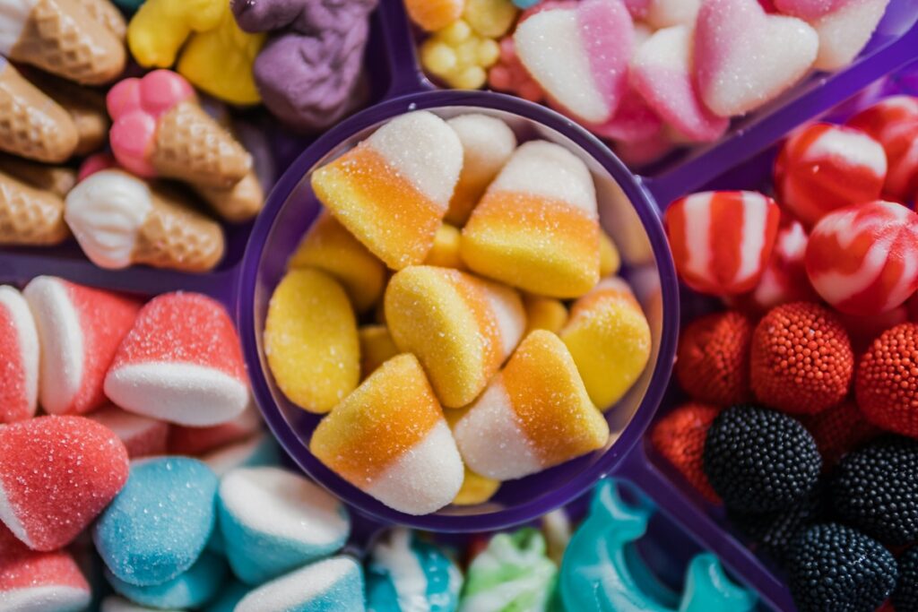 foods that age you faster include added sugar, which you can find in candy