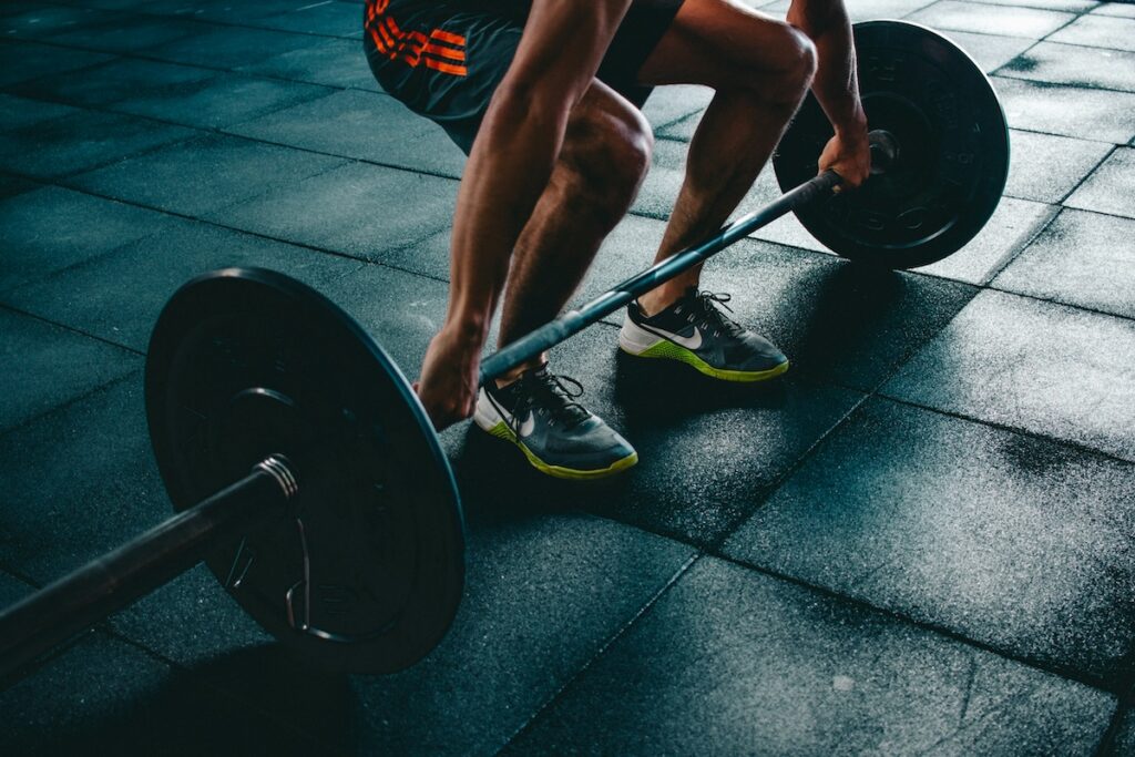a man does a deadlift for max strength as part of the exercises he should be doing per workout