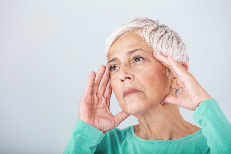 a woman assesses her menopause brain fog