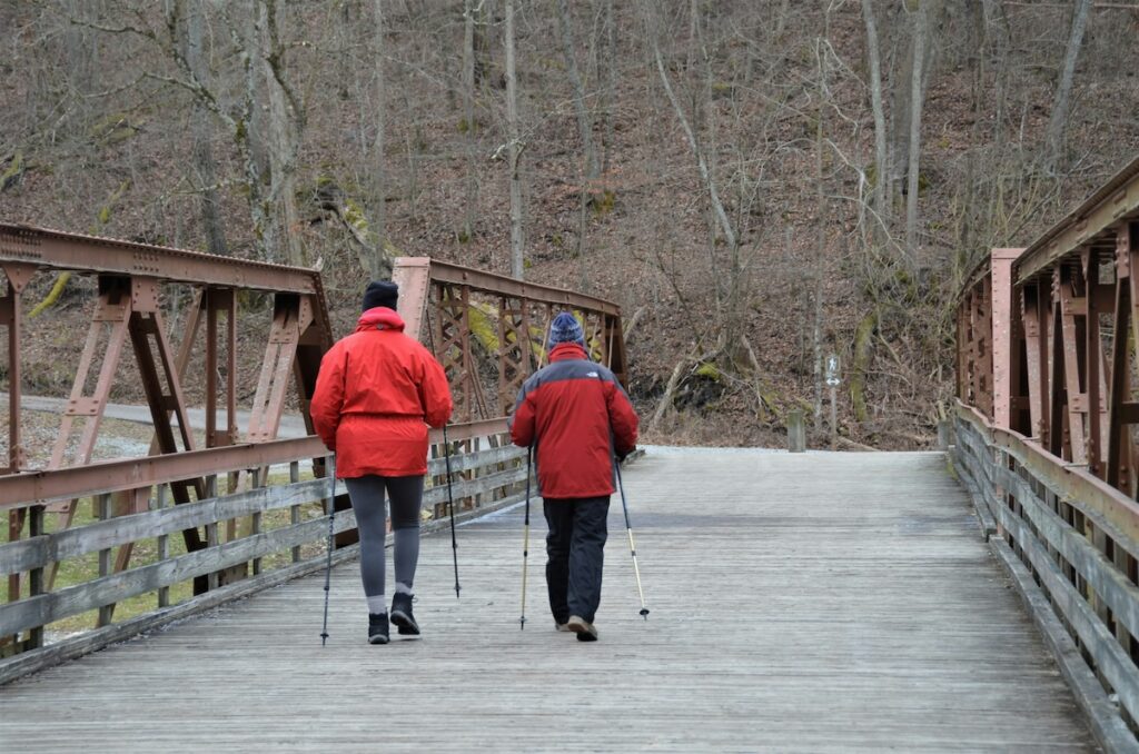 two people walk for gentle movement that can help arthritis