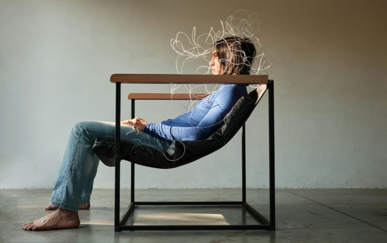 Woman with tangled wire hair illustrating brain fog as a sign of sleep deprivation