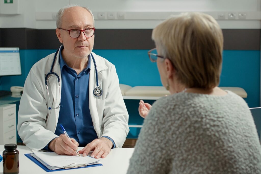 Doctor consulting with patient before recommending supplements to reduce cortisol