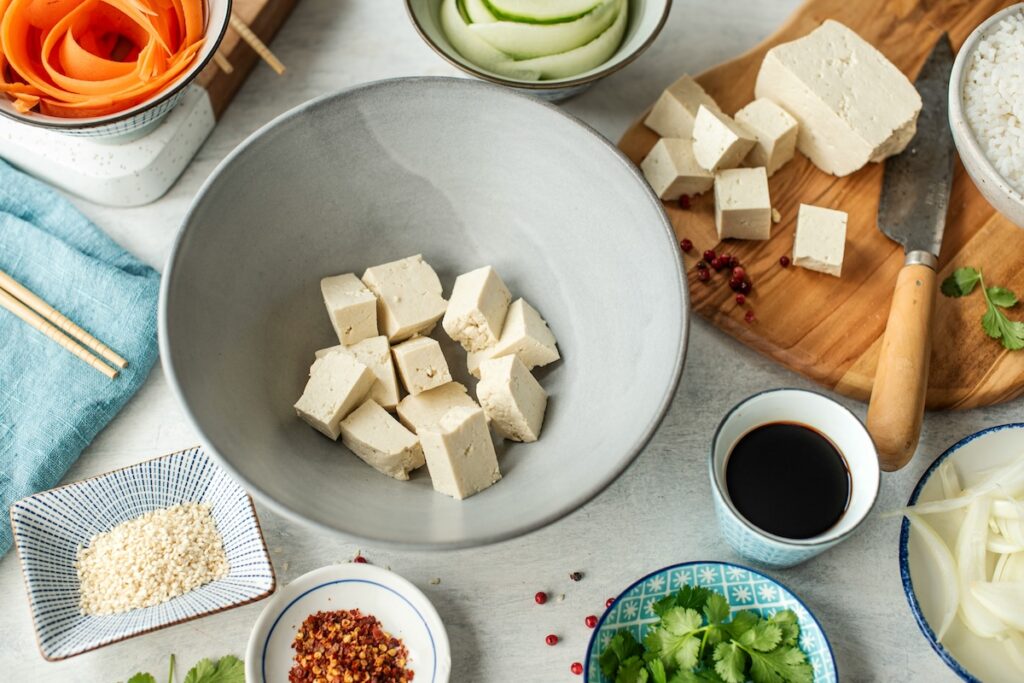 cubed tofu and fresh vegetables prepped for a low calorie lunch ideas stir-fry recipe